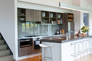 A comfortable and cosy look were achieved in the former shed by using clean lines and a neutral palette in the decoration. Photo / Your Home & Garden
