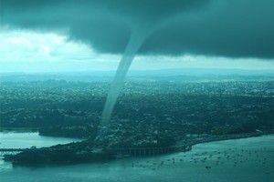 The waterspouts that formed over the North Shore and Waitemata Harbour near the CDB were described as dark, spiralling and 'menacing' and unleashed a deluge of messages on Twitter. Photo / David Simonaire