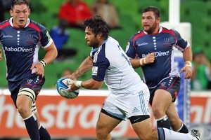 Piri Weepu passes the ball during the Blues pre-season match against the Rebels. Photo / Getty Images