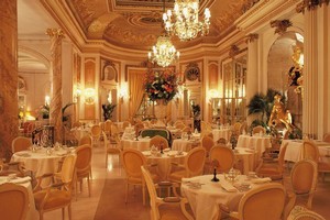 London's The Ritz serves memorable - and expensive - afternoon teas in its opulent Palm Court room. Photo / Supplied