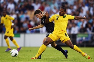 Marco Rojas of the All Whites competes with Jermaine Taylor of Jamaica for the ball. Photo / Getty Images