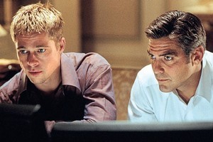 Heists, such as one featured in Ocean's Eleven starring Brad Pitt (left) and George Clooney, could become more common. Photo / Supplied
