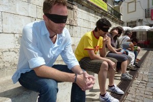 Taking a blind-folded tour of Lisbon. Photo / Robin Esrock