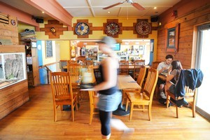 Dos Amigos has a raffish feel to it, featuring demo timber and corrugated iron. Photo / Jason Dorday