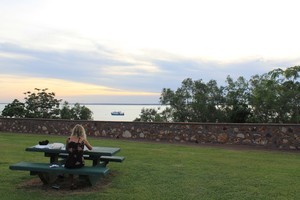Eating fish and chips at Bicentennial Park in Darwin - one of the few cheaper ways of eating out in the city. Photo / Mauricio Olmedo-Perez