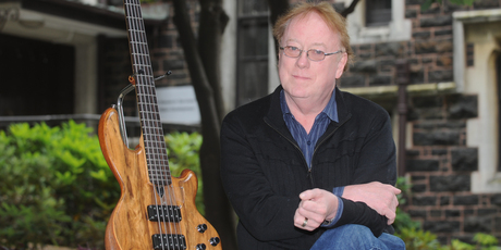 Dr Rob Burns says his rare five-string bass got him some great gigs, such as with Pink Floyd's David Gilmour and on TV shows. Photo / Otago Daily Times