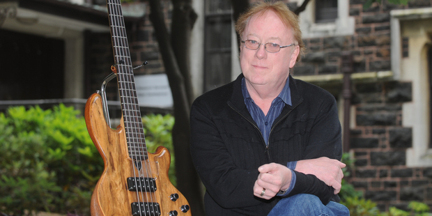 Dr Rob Burns says his rare five-string bass got him some great gigs, such as with Pink Floyd's David Gilmour and on TV shows. Photo / Otago Daily Times