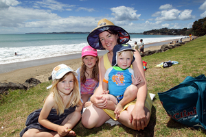 Jacqui Davis, with her children Chelsea, 8, Simone, 5, and Max, 2. Photo / Doug Sherring