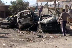 Another car bomb exploded (above) near Damascus in mid-December, killing over a dozen people. Photo / AP