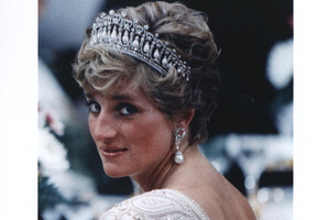 An undated photo of Princess Diana in a tiara and pearl drop earrings, attending a banquet for the Japanese Emperor. Photo / File
