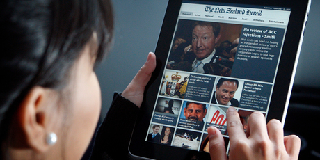 More people are using tablets, including the Apple iPad. Photo / NZ Herald