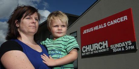 Jody Condin from Taradale - with cancer victim son Toby - was among those angered by Equippers Church claims on divine cancer cures. Photo / APN