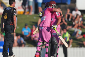 Steven Croft and Anton Devcich of the Northern Knights embrace after defeating the Wellington Firebirds. Photo / Getty Images