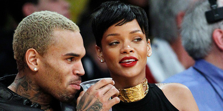 Chris Brown and Rihanna at a Los Angeles Lakers game. Photo/AP