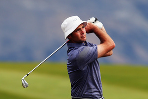 Craig Palmer of New Zealand plays a shot during day three of the New Zealand PGA Championship at The Hills Golf Club in Queenstown. Photo / Getty Images