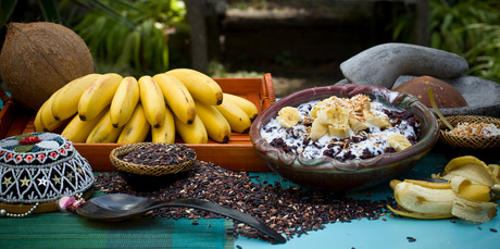Black rice pudding with banana, coconut milk and toasted coconut. Photo / Michael Craig