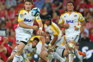 Beauden Barrett of the Hurricanes passes during the round three Super Rugby match between the Reds and the Hurricanes. Photo / Getty Images.