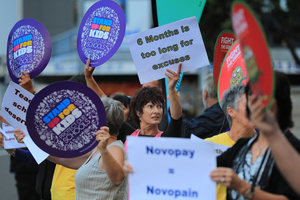 Education professionals protest outside Simon Bridges National office over Novopay. Photo / John Borren