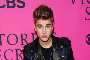 Justin Bieber has slammed reports that he invited underaged friends into a London nightclub. Photo / AP