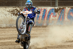 World speedway GP champ Chris Holder doesn't mind getting down and dirty. Photo / Brett Phibbs