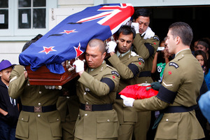 Comrades carry the coffin of Corporal Douglas Hughes at his funeral at Te Terai o Rahiri Marae at Pakotai in Northland last April. Photo / APN