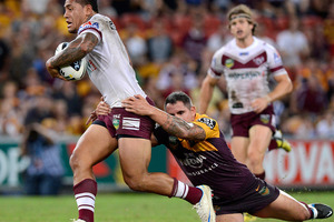 Jorge Taufua of the Sea Eagles is tackled by Corey Parker of the Broncos. Photo / Getty Images.