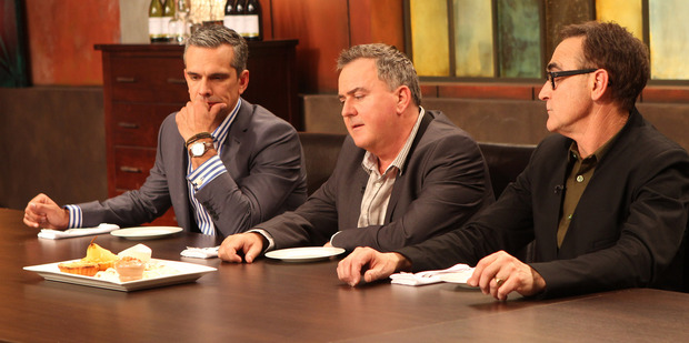 Josh Emett, Simon Gault and Ray McVinnie ponder Vanessa's plate.
