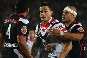 Sonny Bill Williams of the Roosters fights back with Konrad Hurrell of the Warriors. Photo / Getty Images.