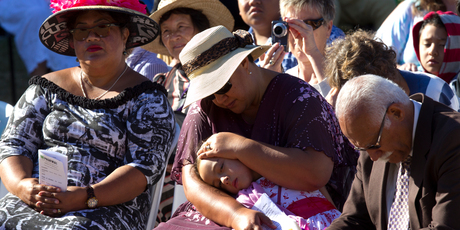 Worshippers were joined by onlookers at the church service at Western Springs Reserve yesterday. Photo / Brett Phibbs