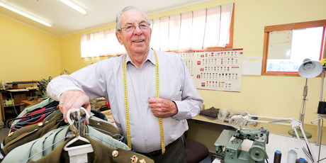 Trentham Military Camp tailor Barry Sarney, 78, has just signed a contract for another two years' work. Photo / Getty Images