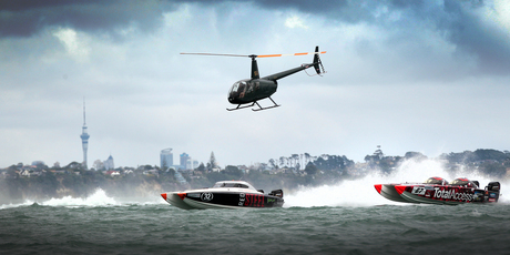 Red Steel and Total Access race in the GJ Gardner Offshore Powerboat Series at Beachlands, Auckland, yesterday. Photo / Doug Sherring
