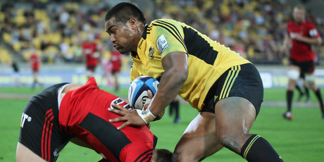 Julian Savea fends off Israel Dagg last week. Photo / Allsport / Getty Images