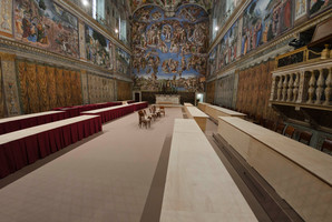 The Sistine Chapel where the cardinals will hold their conclave and (below) firefighters place the chimney that will signal a new pope has been elected. Photo / AP