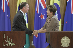 Prime Minister John Key shakes hands with Brazil's President Dilma Rousseff in Brasilia. Photo / AP