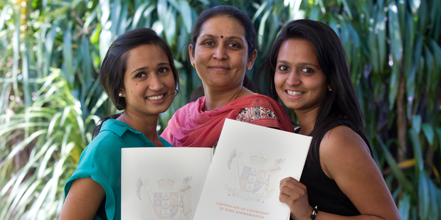 Rachna Jayeshkumar Patel with her daughters Nupur (left) and Krupa at the Waitangi Day Citizenship Ceremony at Government House, Auckland. Photo / Richard Robinson