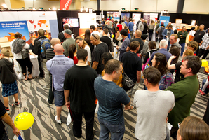 People queue up at one of the mining stalls during the Oz Jobs Expo. Photo / NZ Herald