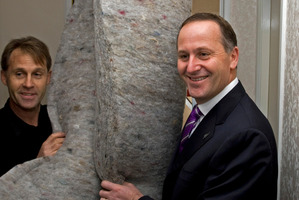 John Key marks the first two months of the Government's home insulation scheme in 2009. Photo / David Rowland