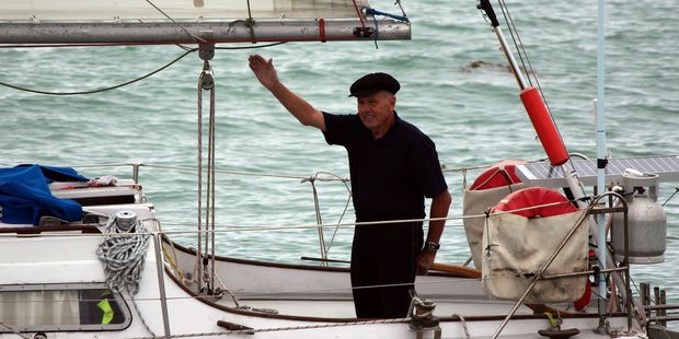 Ron Daw waves goodbye to a crowd of family and friends as he set off for a solo voyage around the world. Photo / Rebecca Ryan