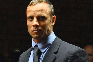 Oscar Pistorius is a broken man after the death of his girlfriend, his close friend Mike Azzie says. Photo / AP