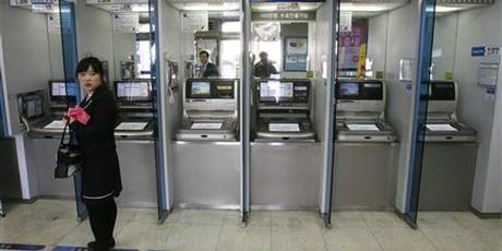 There were no immediate reports that bank customers' records were compromised, but the disruption froze part of the country's commerce. Photo / AP