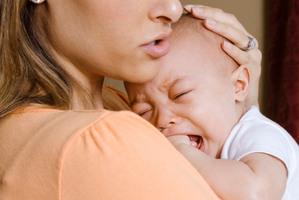 One in 10 parents feigned sleep to avoid dealing with a crying child. Photo / Getty Images
