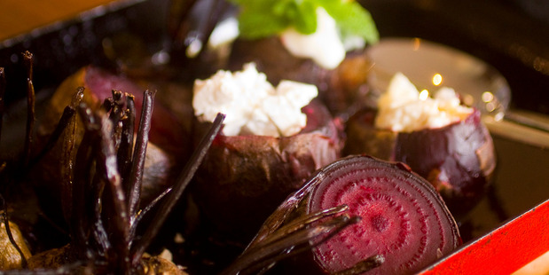 Slow-roasted beetroot with sour cream and mango salsa. Photo / Michael Craig