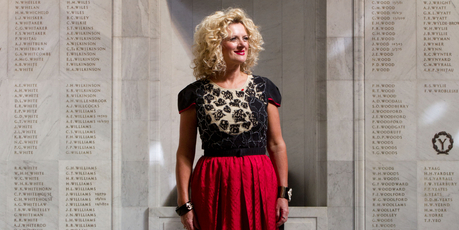 Trelise Cooper wore a red and black outfit to match the poppy brooch on her top when she visited the World War I sanctuary at the Auckland Museum yesterday. Photo / Richard Robinson