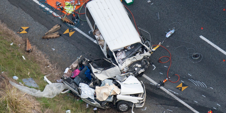 Fatal motor vehicle accident involving a van and a car South of Helensville on State Highway16. Photo / Richard Robinson.