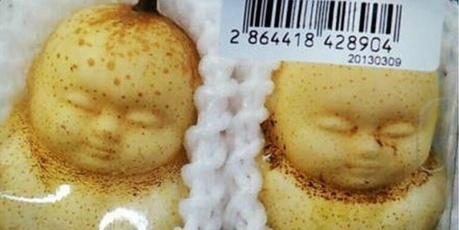 These unnerving anthropomorphic pears, shaped during initial stages of growth using special moulds, were seen at a supermarket in Beijing and are called "happy/joyful doll pears". Photo / Supplied