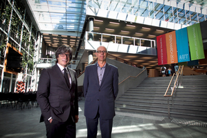 AUT vice-chancellor Derek McCormack (left) and architect Richard Harris in the building's atrium. Photo / Natalie Slade