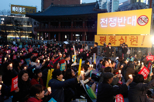 South Korean protesters shout slogans during a rally denouncing the annual joint military exercises, dubbed Key Resolve and Foal Eagle between South Korea and the United States. Photo / AP