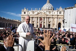 Pope Francis is driven through the crowd in his popemobile in St. Peter's Square for his inauguration Mass at the Vatican. Photo / AP
