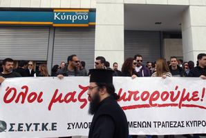 Cypriots are furious at the possibility of losing part of their savings. Photo / AP