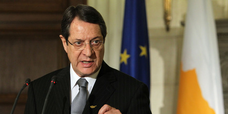 President Nicos Anastasiades briefed MPs last night, with a tough ride for the draft expected at a full plenum this morning. Photo / AP